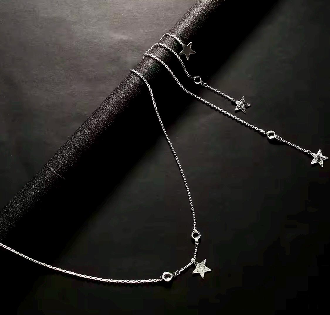 Collier de fête dos étoiles argenté